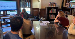 A group of people at a conference table.